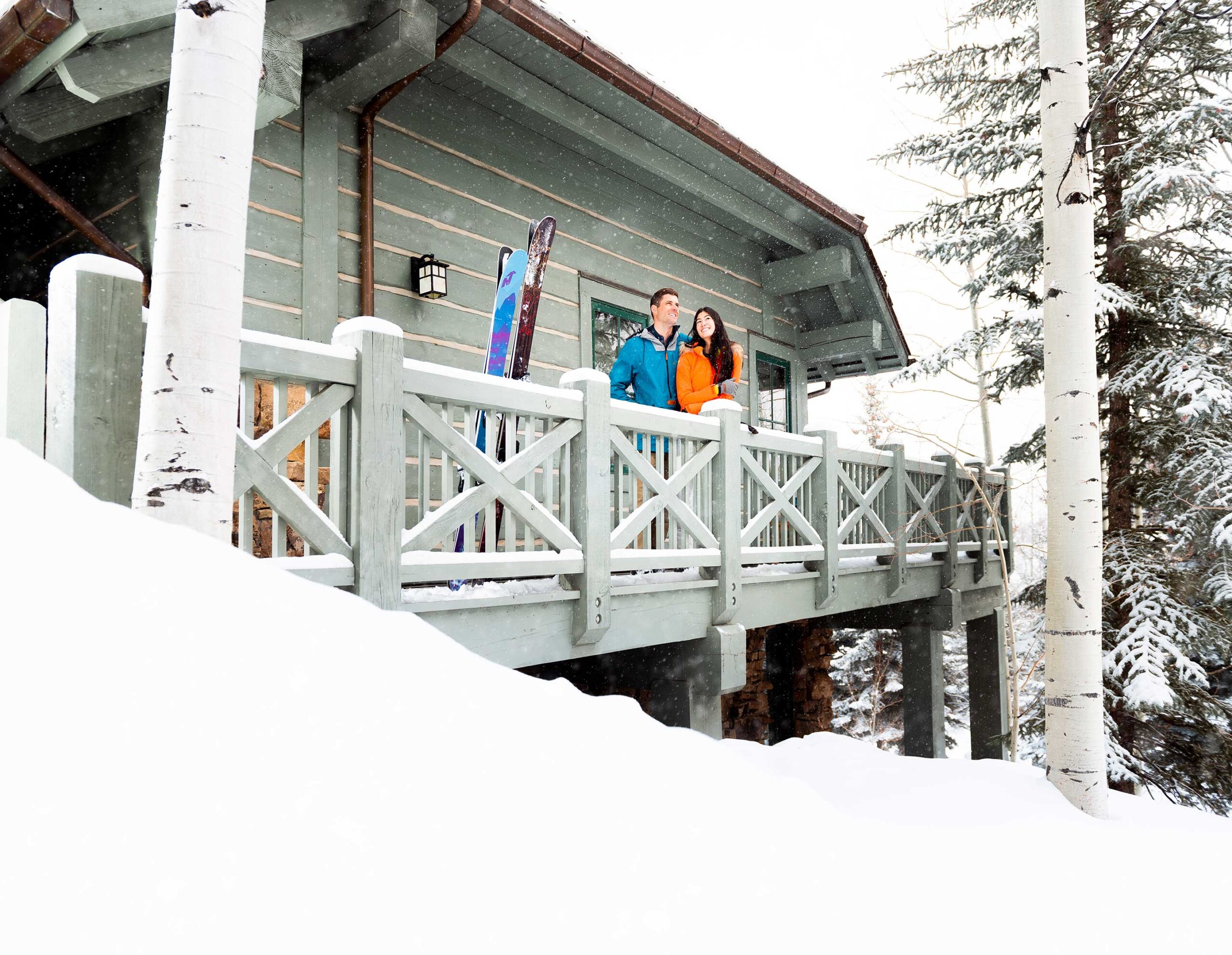 Couple on deck in winter in Beaver Creek